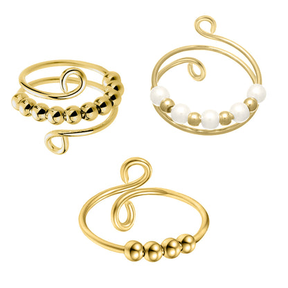 Draaiende parel anti-stress ring, goudkleurig (316L staal), set van 3