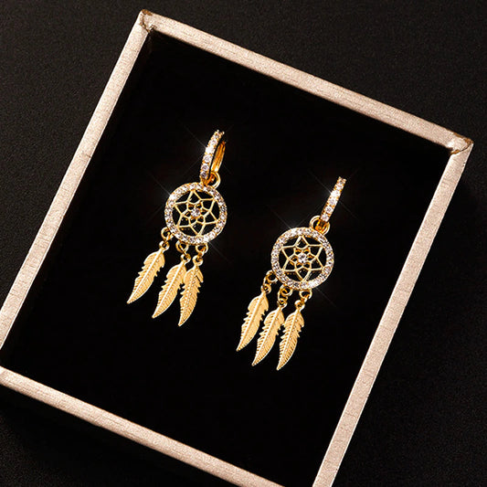 Dreamcatcher oorbellen verguld met 14 karaat goud