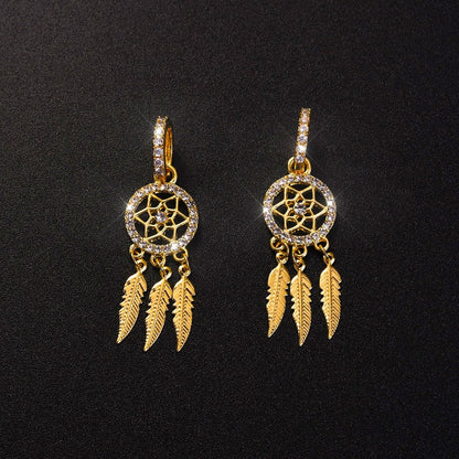 Dreamcatcher oorbellen verguld met 14 karaat goud