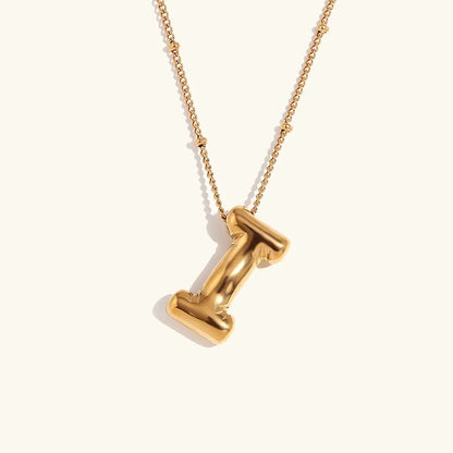 Gouden ketting met ballon-initiaal