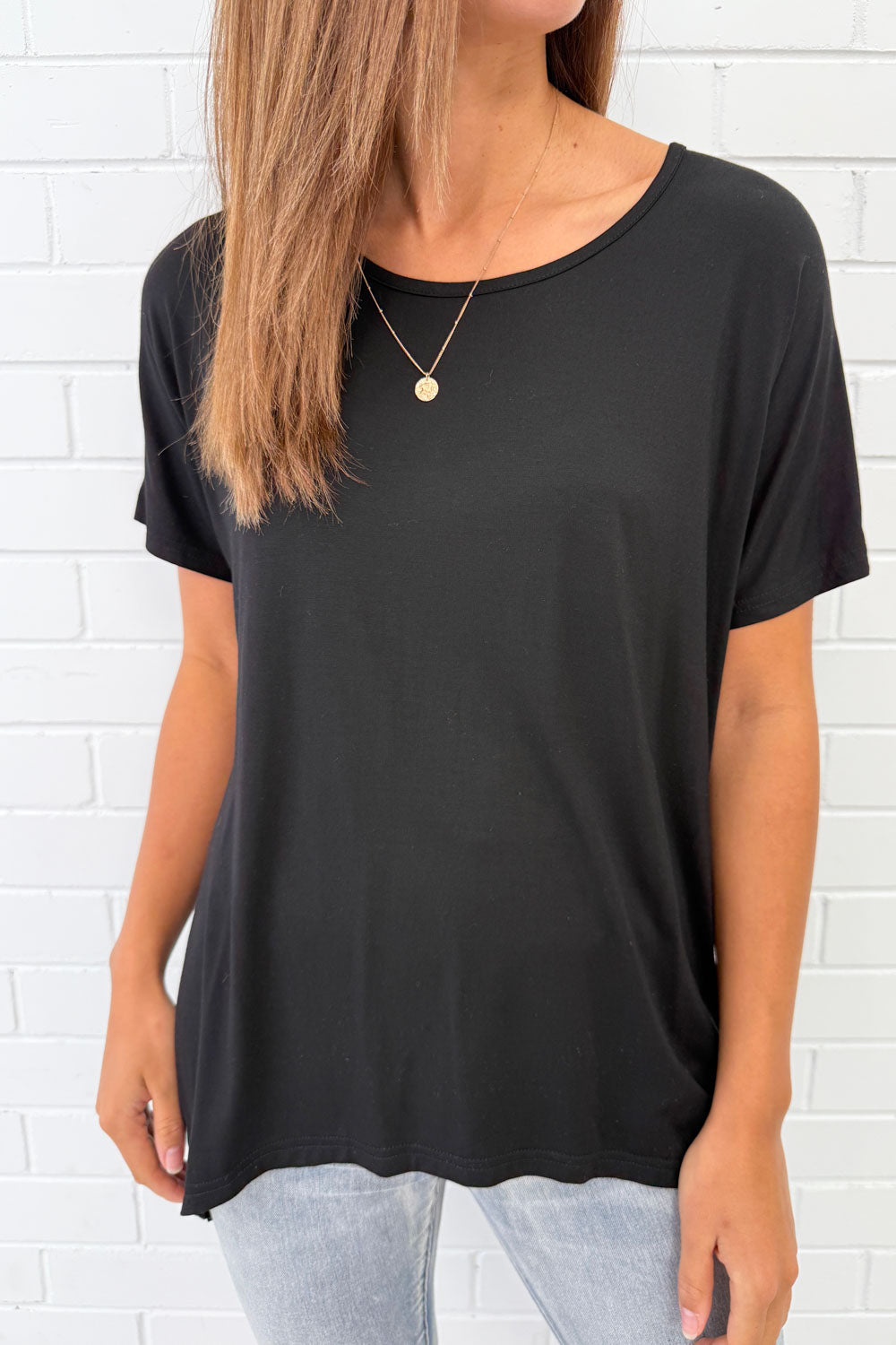 Softique | T-shirt Met langer achterpand - Zwart