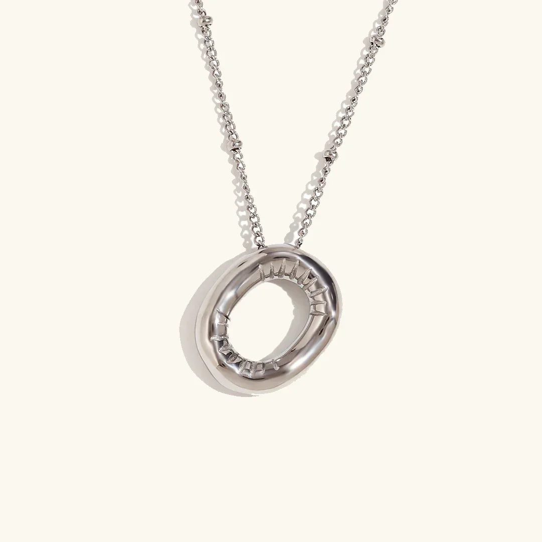 Gouden ketting met ballon-initiaal