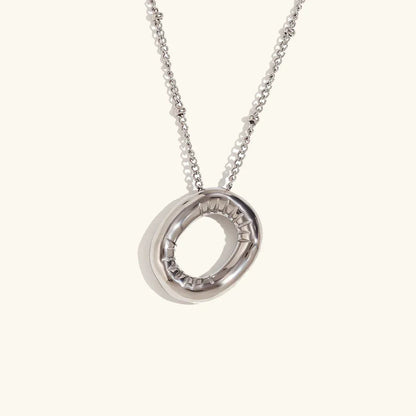 Gouden ketting met ballon-initiaal