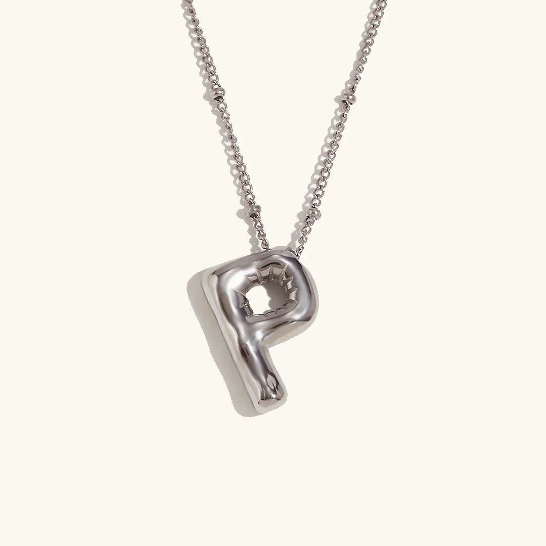 Gouden ketting met ballon-initiaal
