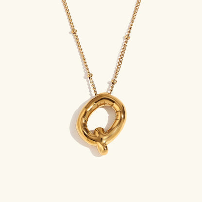 Gouden ketting met ballon-initiaal