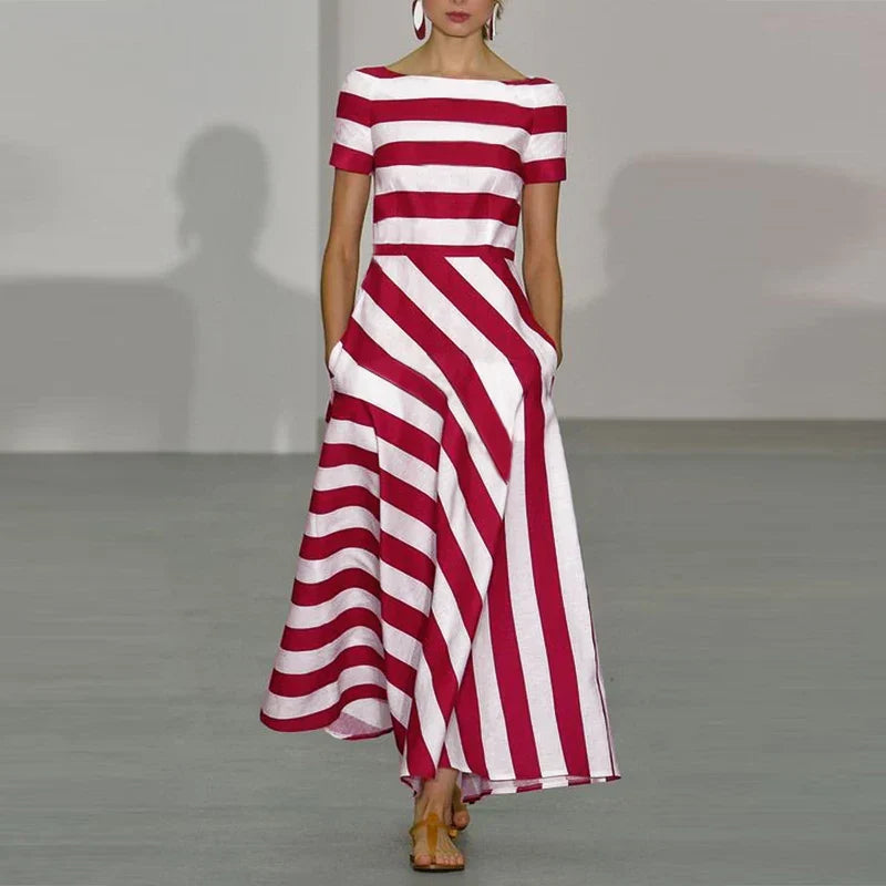 JULIE MAXI JURK – MODERN STREEP MET ELEGANTE UITSTRALING