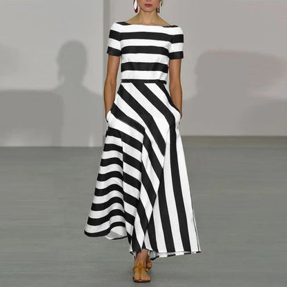 JULIE MAXI JURK – MODERN STREEP MET ELEGANTE UITSTRALING