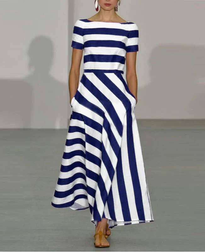JULIE MAXI JURK – MODERN STREEP MET ELEGANTE UITSTRALING