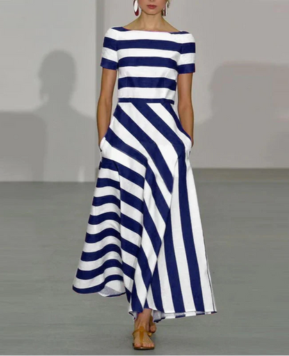 JULIE MAXI JURK – MODERN STREEP MET ELEGANTE UITSTRALING