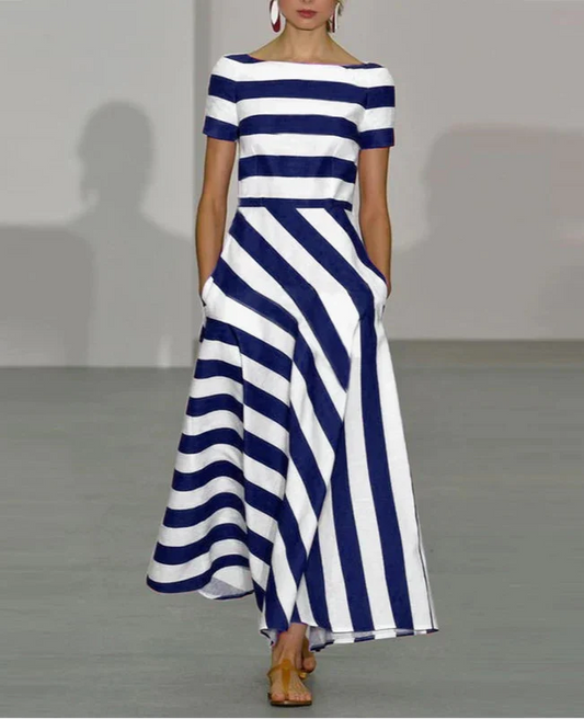 JULIE MAXI JURK – MODERN STREEP MET ELEGANTE UITSTRALING