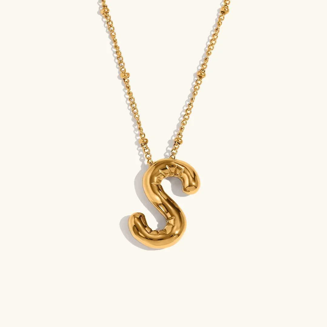Gouden ketting met ballon-initiaal
