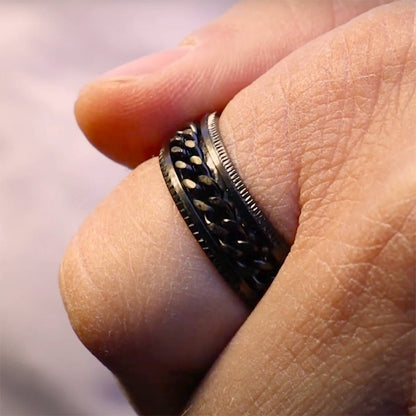 Zwarte antistressring met draaibare kettingring (316L-staal)