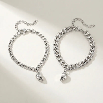 Set bijpassende armbanden met magnetisch hart